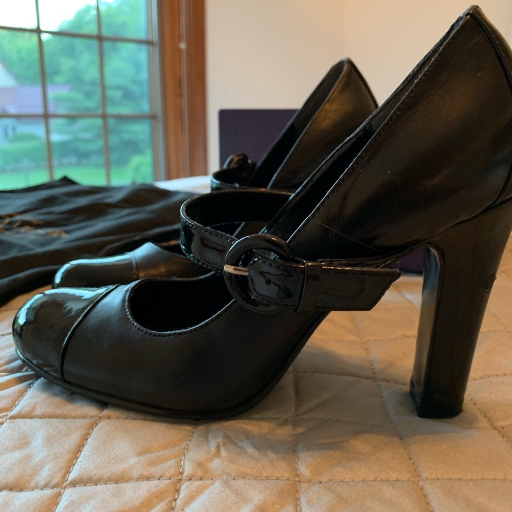 Enzo black patent and leather heels for sale.